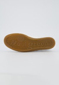 Suola di sneakers beige con gomma testurizzata, caratterizzata da un logo circolare e linee ondulate. Resistente e flessibile con una base marrone a contrasto.