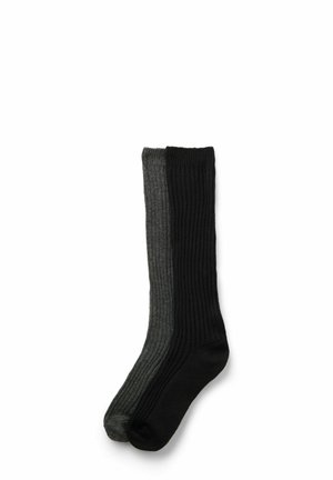 Calze al ginocchio a coste con un design bicolore in grigio scuro e nero. Tessuto morbido con una vestibilità comoda.