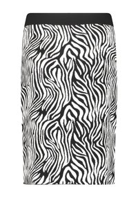 Jupe à motif zèbre noir et blanc avec une coupe ajustée et une taille noire unie. Fabriquée en tissu lisse et extensible.