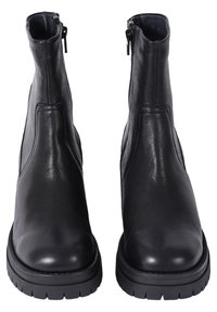 Musta nahkakengät nilkkapituiset, joissa on sileä pinta, sivuvetoketju, paksu pohja ja vähäiset ompeluyksityiskohdat.