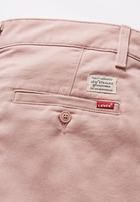 Levi's® XX CHINO SLIM TAPER PANTS - Chinos - adobe rose repreve cool