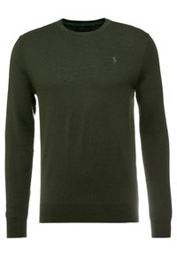 Tmavě zelený pulovr z měkké pletené látky, s kulatým výstřihem a dlouhými rukávy, s malým logem na hrudi.