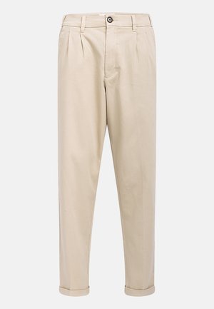 Beige bukser med læg foran, der har knappelukning og opbukket kant. Fremstillet af et glat og let stof.