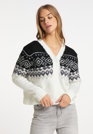 Strikket cardigan med et geometrisk mønster i sort, grå og hvid, V-hals og knapper. Blød tekstur med ribbede manchetter og kant.