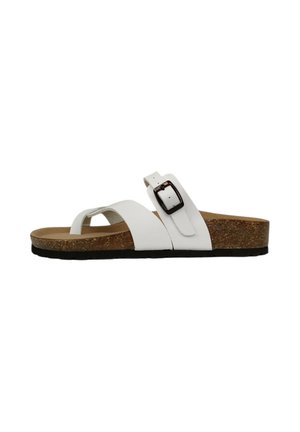 Sandalo con letto in sughero bianco, con cinghie incrociate e fibbia regolabile. Presenta una suola in sughero texturizzato e suola esterna piatta in gomma nera.