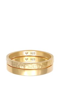Gold-tone stacked rings with a textured and smooth finish. Marked with "925" for sterling silver, featuring a diamond-shaped logo.