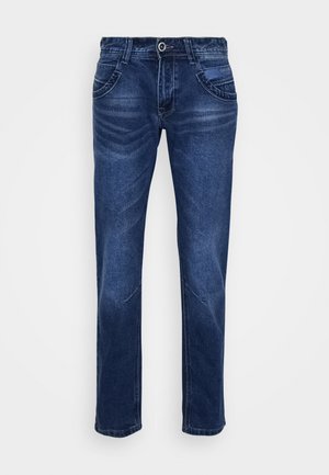 Jean en denim bleu foncé avec une coupe droite, dotées de cinq poches, de coutures contrastantes et d'une fermeture à bouton à la taille.