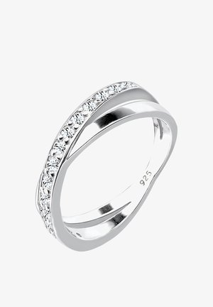 Un inel din argint cu o finisare netedă. Prezintă un rând de pietre clare montate pe marginea superioară și un marcaj „925” pentru argint sterling.