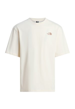 Jednoduché krémově bílé tričko s krátkým rukávem a malým světle hnědým logem The North Face na levé horní straně hrudi.