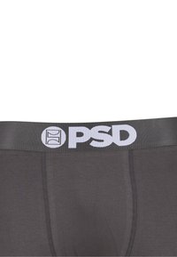 Boxer gris foncé avec une large ceinture arborant le logo blanc "PSD" et un graphique circulaire sur le côté gauche.