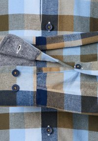 Men's flannel shirt featuring a blue, brown, and tan plaid pattern; cotton fabric, button front, and contrasting dark blue buttons.