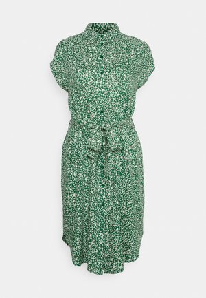 Groene korte mouwen blousejurk met witte onregelmatige stippenprint en een gebonden stoffen ceintuur in de taille.