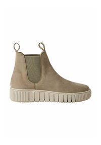 Bottines Chelsea en daim beige avec des côtés élastiques, des poignées en boucle et une semelle en caoutchouc texturé. Conçues avec une silhouette moderne et épurée.