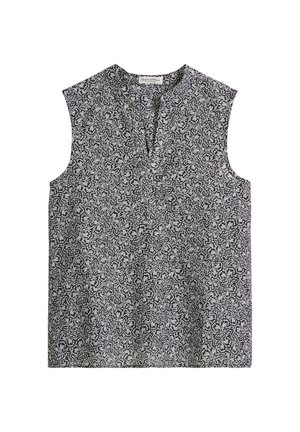Mouwloze zwart-witte top met abstract bloemmotief en lichte V-halsopening.
