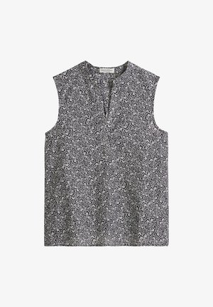 Mouwloze zwart-witte top met abstract bloemmotief en lichte V-halsopening.