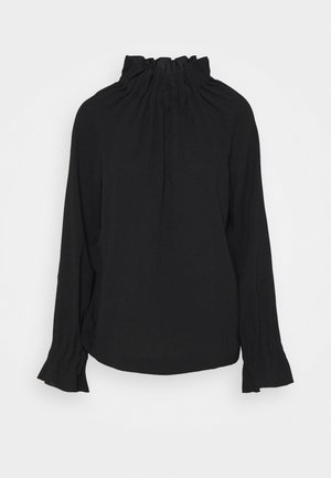Schwarze Bluse mit einem gerafften hohen Kragen, langen Ärmeln und Rüschensaum. Hergestellt aus einem weichen, leichten Stoff mit einer glatten Textur.