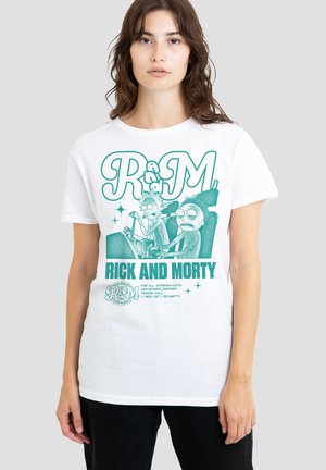 Young person wearing white T-shirt with cartoon characters Rick and Morty in a car and text "Rick and Morty" in green print.