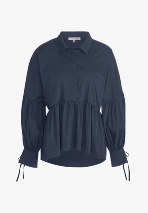 Marineblaue Bluse mit kragenförmigem Ausschnitt, Knopfverschluss, gerafftem Oberteil und voluminösen Ärmeln mit Bindebändern an den Manschetten. Glatte Textur des Stoffs.