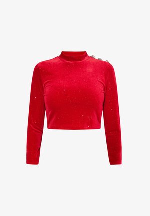 Punane sametist pika varrukaga lühike topp kõrge kaelusega, millel on hajutatud sädelevad detailid ja dekoratiivsed nupud vasakul õlal.