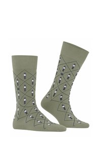 Grüne Baumwollsocken mit einem Rautenmuster. Enthält kleine, weiße Zeichen in einem sich wiederholenden Design. Verstärkter Fersen- und Zehenbereich.