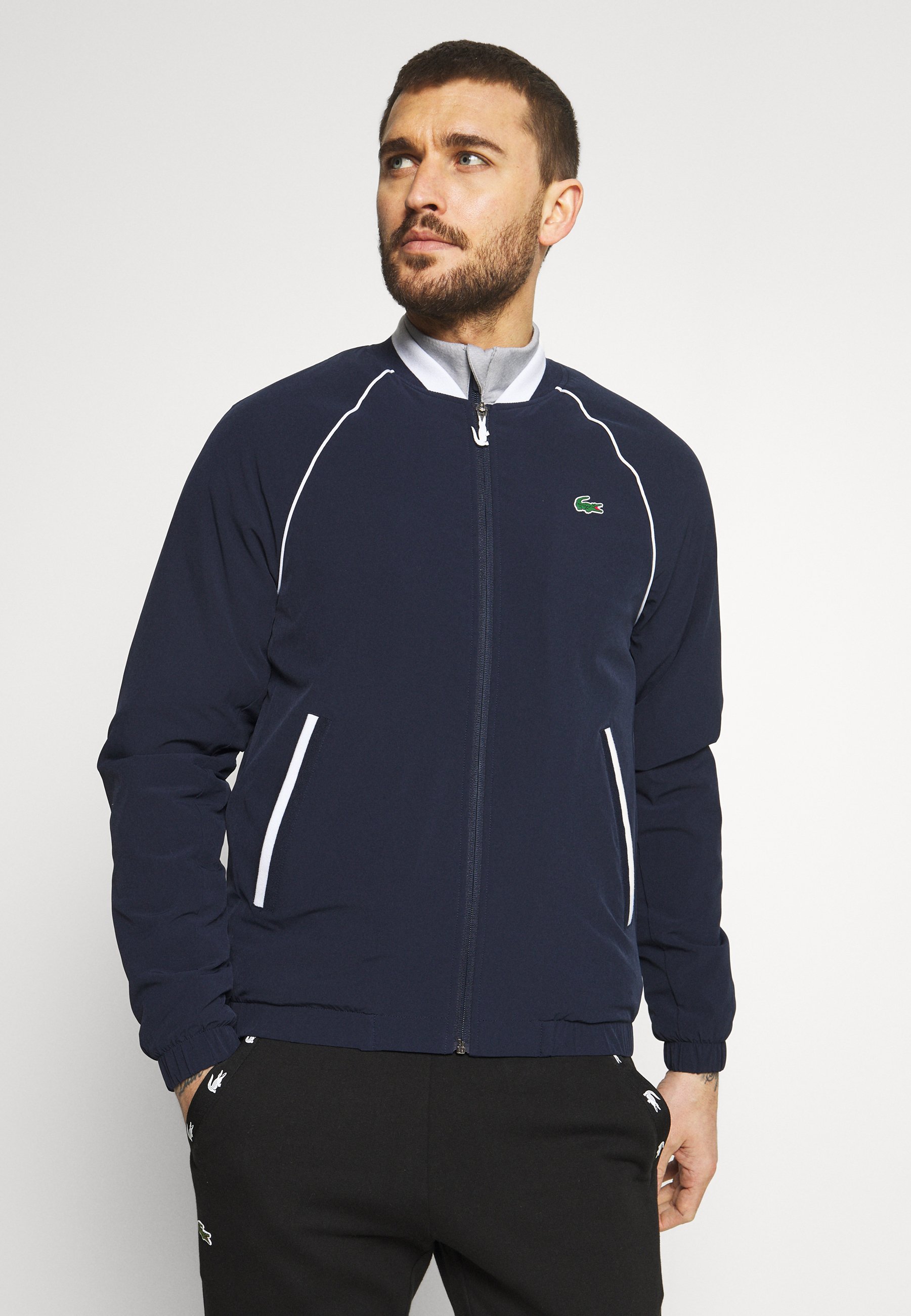 navy blue golf jacket