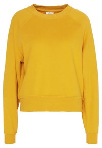 Sudadera amarilla de cuello redondo con mangas raglán, puños y dobladillo acanalados. Confeccionada con una suave tela texturizada. Diseño sencillo sin patrones.