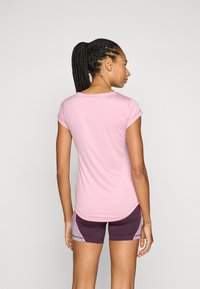 Puma TEE - Sport T-Shirt - poised pink heather