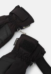 Black gloves made of GORE-TEX with a textured leather palm, velcro strap, elastic cuff, and a metal clip for attachment.