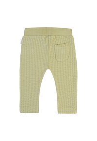 Jasnożółte bawełniane spodnie z teksturowanym wzorem waflowym, elastycznym pasem w talii i detalem kieszeni na plecach. Gładkie szwy i długość do kostek.