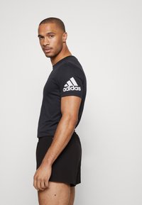 adidas Performance ADIZERO SPLIT - Pantalón corto de deporte - black