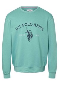 Light teal sweatshirt with U.S. Polo Assn. logo, two polo players on horses, and "Since 1890" text on the front.