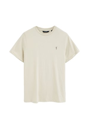T-shirt beige a maniche corte con girocollo, con piccolo logo ricamato di un giocatore di polo sul petto sinistro e etichetta interna nera sul colletto.