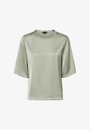 Jasnozielona bluzka z krótkim rękawem, wykonana z gładkiego, teksturowanego materiału. Posiada okrągły dekolt i luźny, pudełkowy krój.
