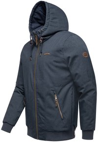 Dark blue hooded jacket made of textured fabric, featuring a front zipper, two side pockets, and brown accents on the zippers and shoulder.