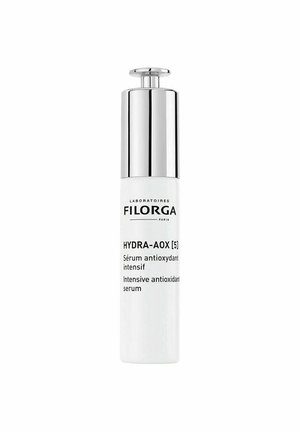 Filorga Hydra-AOX intensiv antioxidant serum i en hvid flaske med en skinnende sølv pumpe.