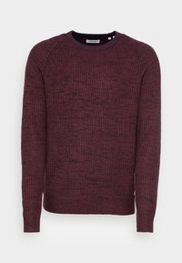 Röd texturerad tröja med rund halsringning, långa ärmar och ribbade muddar. Tyget har ett vävt mönster och en lätt glans.