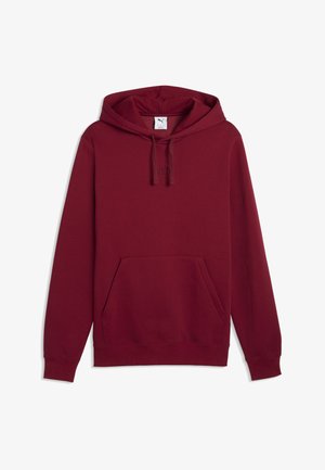 Sweat à capuche bordeaux avec poche kangourou avant et cordons, affichant un logo de marque discret sur la poitrine.