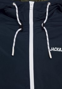 Jack & Jones JJERUSH HOOD - Športna jakna/jopica - blau