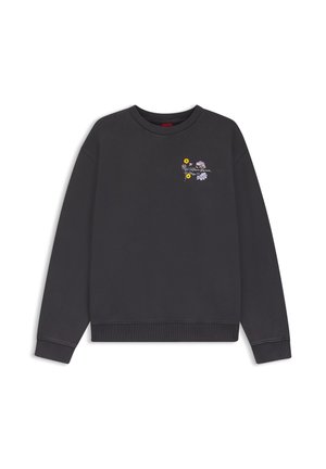 Σκούρα γκρι φούτερ με στρογγυλό λαιμό, μικρή κεντητή λουλουδένια διακόσμηση και το κείμενο «Wildflower Reserve est. 1975» στο αριστερό μέρος του στήθους.