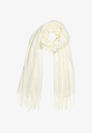 Cream-colored scarf made of soft fabric, featuring a smooth texture and fringed edges. Draped in a circular shape for display.