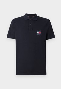 Mørkeblå kortermet polo skjorte med to knapper og liten Tommy Hilfiger-logo og "1985" på venstre bryst.