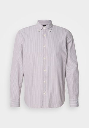 Button-up shirt in light purple and white stripes, cotton fabric, long sleeves, and a button-down collar, featuring yellow buttons and side slits.