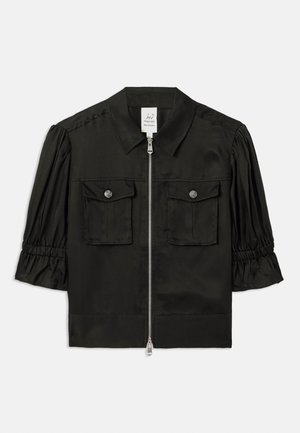 Black short-sleeve jacket with a collared neckline, zip front, two chest pockets, and gathered sleeves made of smooth fabric.