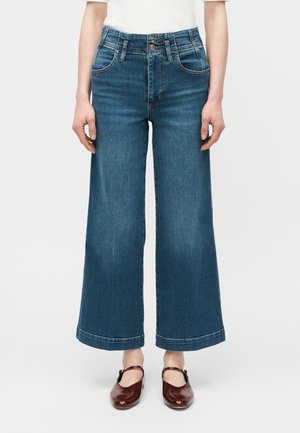 THE SEAMED - Široké nohavice - blue