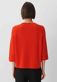 someday. Stickad tröja - red