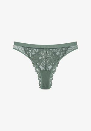Zielony koronkowy thong z kwiatowymi wzorami, szerokim elastycznym paskiem w talii oraz delikatnymi falbankami na tylnym brzegu i otworach na nogi.