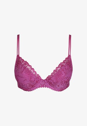 Vaaleanpunainen pitsirintaliivit, joissa on kukkakirjailu, säädettävät olkaimet ja pehmeät kupit. Reunakohdat ovat siksakkuvioiset ja koristeelliset yksityiskohdat korostavat mallia.