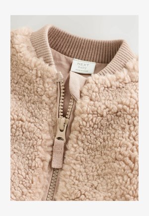 Fleece bomberjack in lichtbeige, met een geribbelde kraag, ritssluiting met beige beslag en een gestructureerd oppervlak. Gekenmerkt met "NEXT baby."