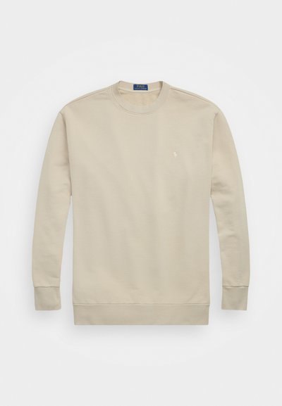Sweatshirt crew neck bege feito de mistura de algodão, com punhos e barra canelados, apresentando um pequeno logótipo bordado no peito.