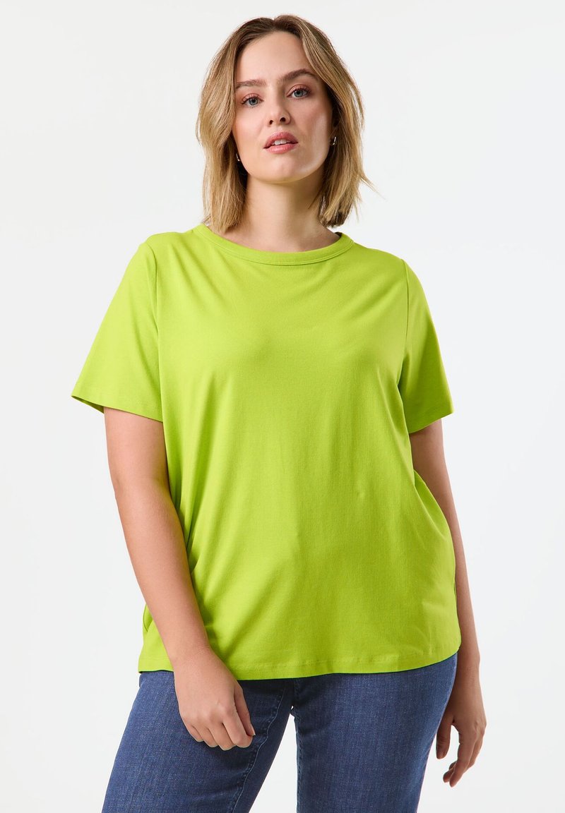 Lime green short-sleeve t-shirt with a round neckline in a relaxed fit, made of soft cotton material. Simple design, no patterns or accents.